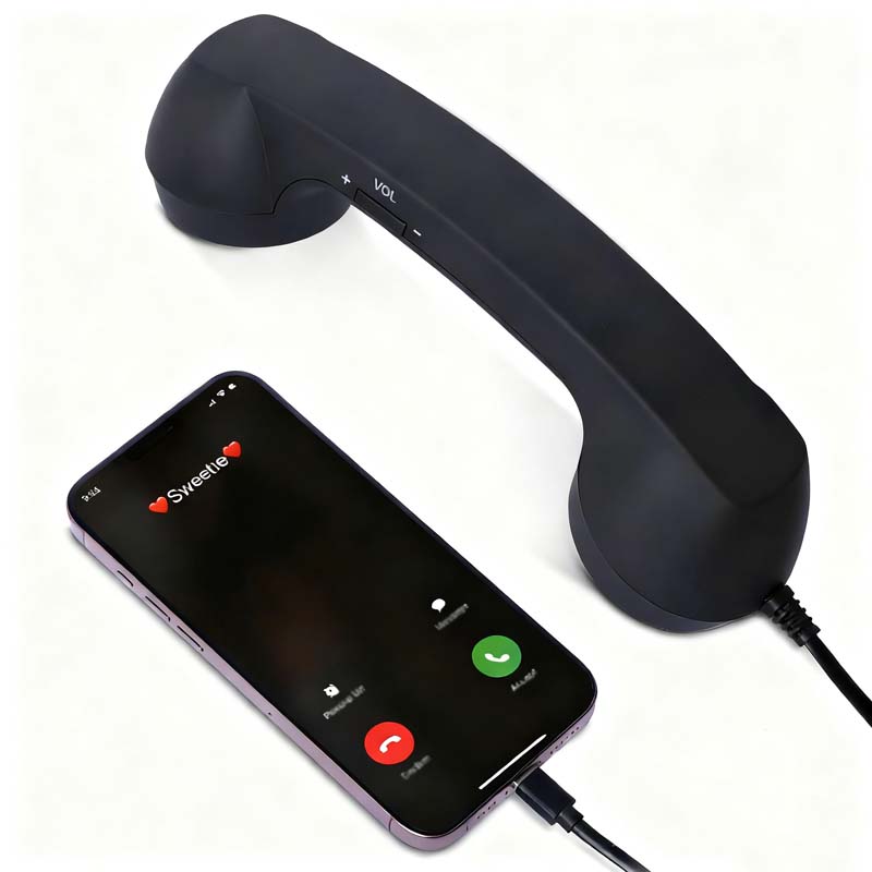 Vintage-Retro-Telefongriff mit Handy-Hörer und Mikrofon/Vintage retro telephone handle with mobile phone handset and microphone
