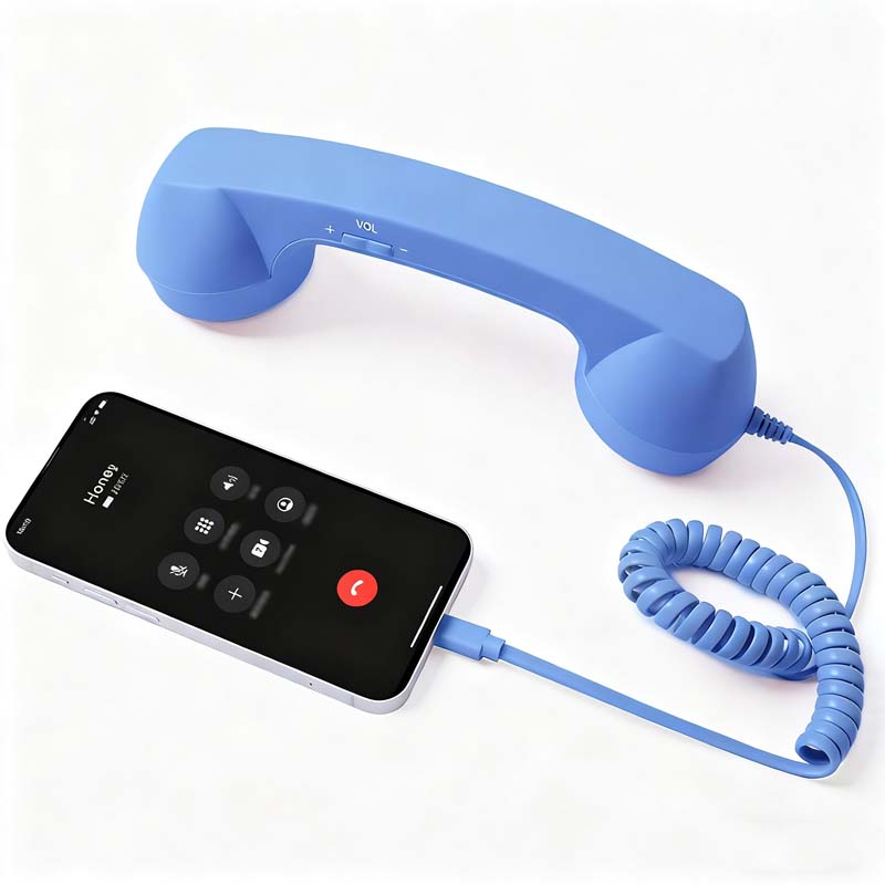 Vintage-Retro-Telefongriff mit Handy-Hörer und Mikrofon/Vintage retro telephone handle with mobile phone handset and microphone