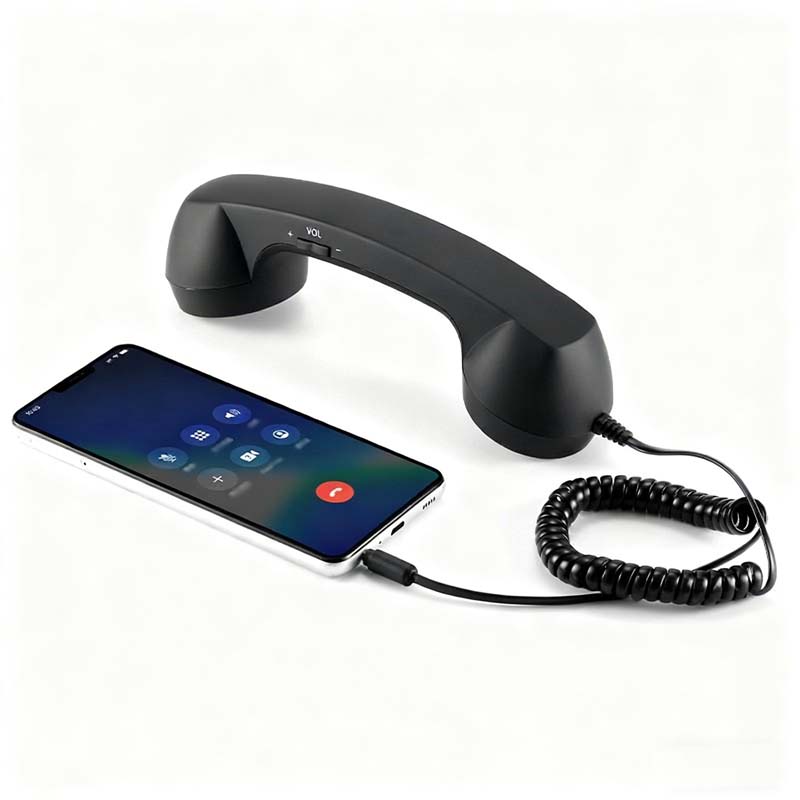 Vintage-Retro-Telefongriff mit Handy-Hörer und Mikrofon/Vintage retro telephone handle with mobile phone handset and microphone