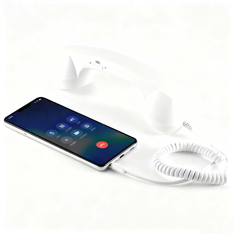Vintage-Retro-Telefongriff mit Handy-Hörer und Mikrofon/Vintage retro telephone handle with mobile phone handset and microphone