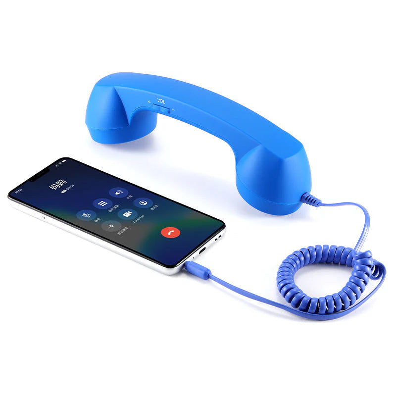 Vintage-Retro-Telefongriff mit Handy-Hörer und Mikrofon/Vintage retro telephone handle with mobile phone handset and microphone